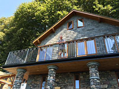 Picture of owner on his new extension with balcony above Grasmere (July 2014)