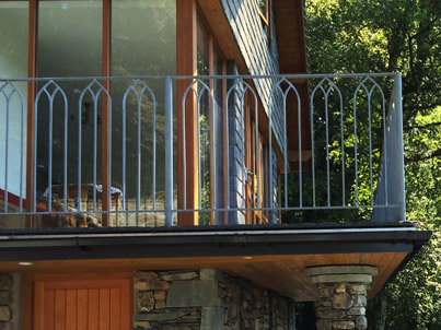 Cottage extension with balcony above Grasmere