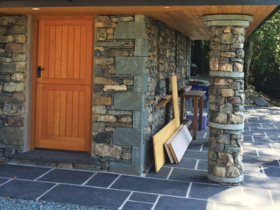 Cottage extension with balcony above Grasmere stone pillar - Click for larger image