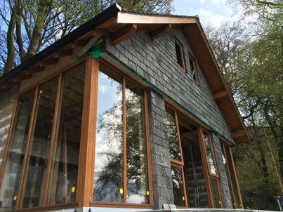 Cottage extension with balcony above Grasmere