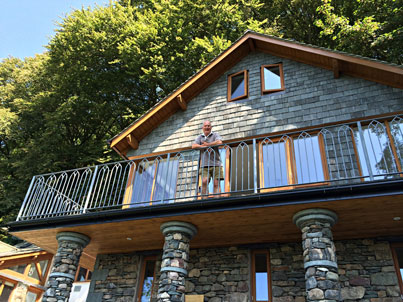 Cottage extension with balcony above Grasmere