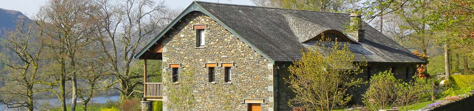 New House overlooking Coniston Water with unusal eyebrow dormer window - Click for larger image