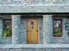 Office entrance Great Langdale porch with local stone pillars and facing